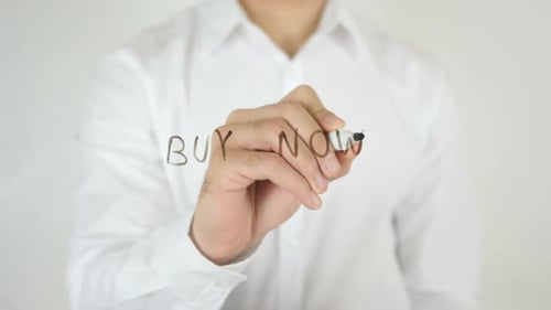 Buy Now Message Written on Clear Surface