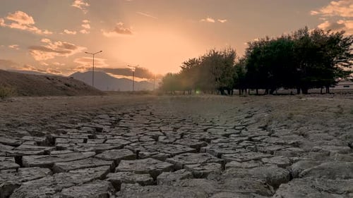 Dry Cracked Land Landscape at Sunrise Time Lapse