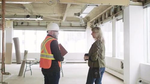 Construction Foreman and Owner Planning Office Remodel Adult