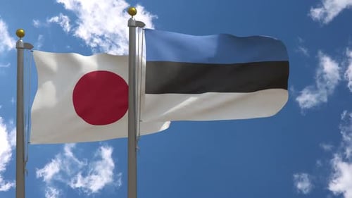 Realistic Flags of Japan and Estonia Waving in Blue Sky