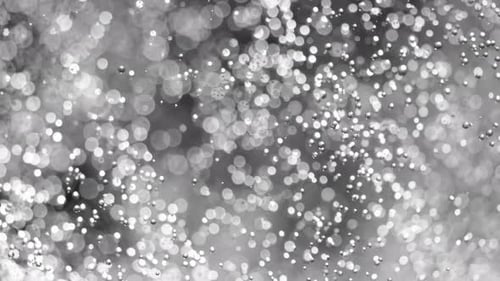 Abstract Footage of Flowing Illuminated White Water Bubbles
