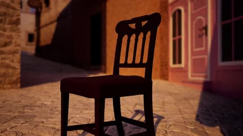 A Wooden Chair Sitting on Top of a Cobblestone Street