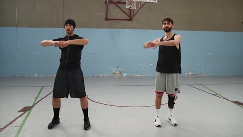 Men Warming Up for Basketball Practice