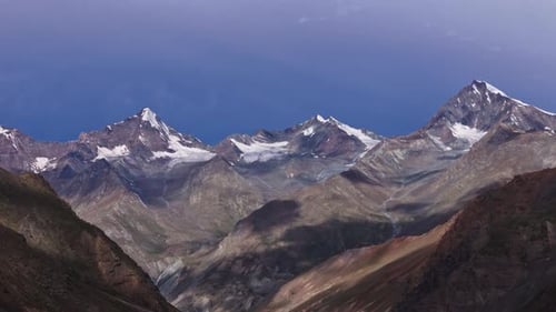 Snowy Mountain Peaks and Rocky Ridges Drone View