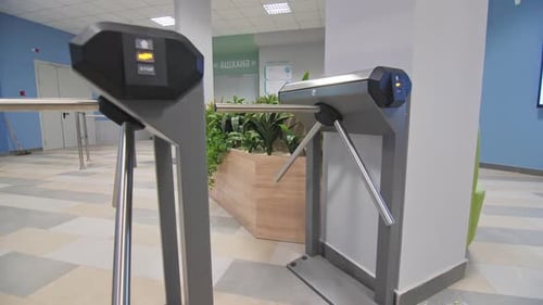 Turnstile Tourniquets with Glowing Indicator in Office