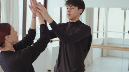 Duet Performing Contemporary Improvisation in Dance Studio