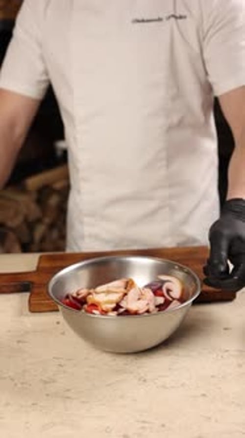 Chef prepares a delicious salad in a restaurant