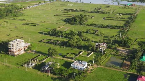 Aerial residential property land plot. Land for sale. Real estate project in greenery in a sunny day
