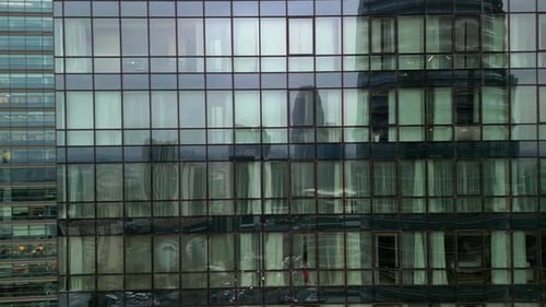 Glass facade of the skyscraper sideways shot