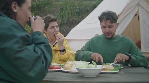 Friends Eat Lunch Together in Nature