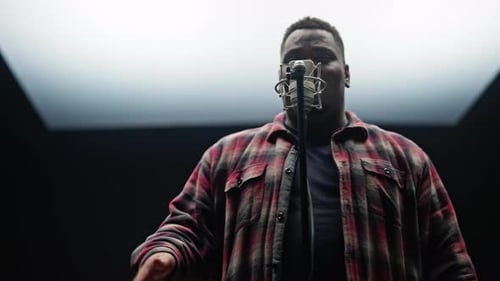 Singer Performing With Feelings In A Studio