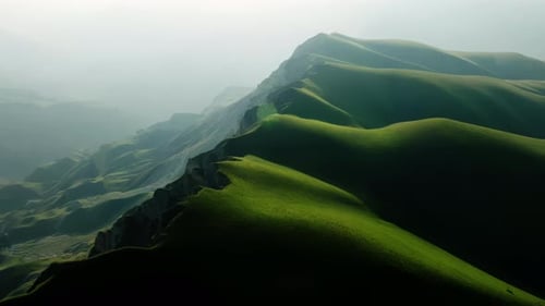 Amidst the Fog the Rugged Mountains Rise High in the Green Highlands Creating a Breathtaking