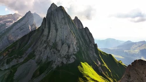 Schäfler Switzerland towering mountain peak with sharp ridges and surrounding alpine landscape