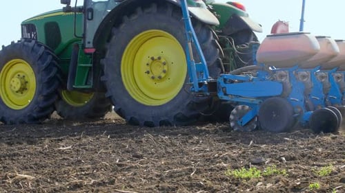 Seeder is working in the field