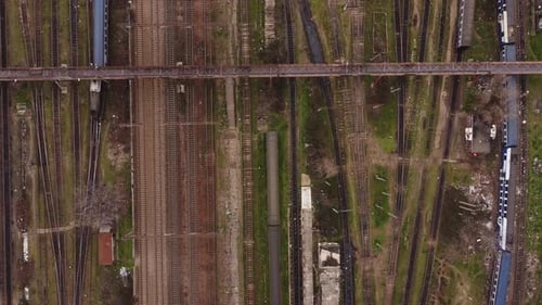 Aerial Top View Of Old Passenger Train. Railway tracks seen from above