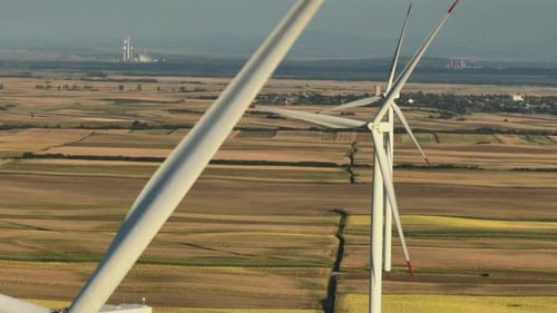 Aerial view of wind turbines rotating