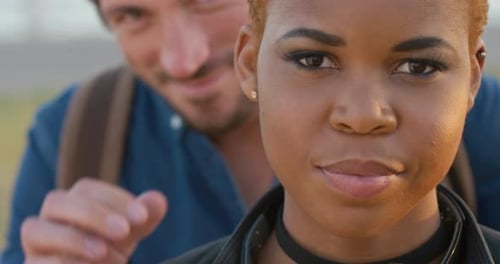 Affectionate Couple Embracing, Smiling at Camera