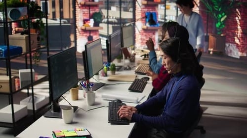 Multiethnic Team of Call Center Agents Answering Clients