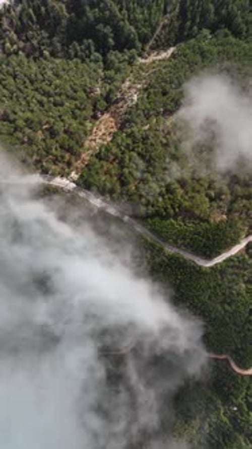 Vertical Video Cloudy Landscape in the Mountains Aerial View