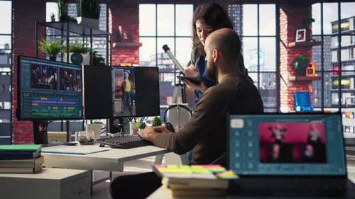 Man and Woman Collaborate on Content Creation for the Media Industry