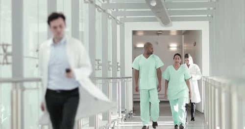 Surgeons walking through a hospital