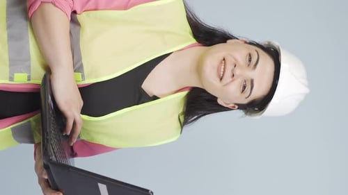 Vertical video of The engineer approves the news she heard.