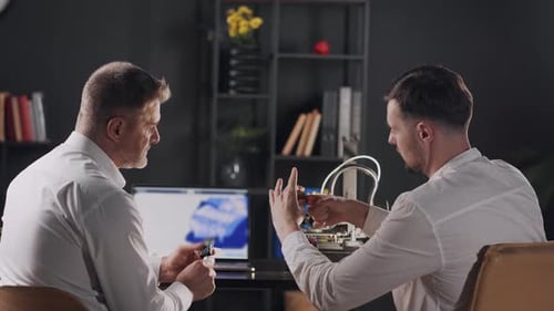 Two Medical Engineers Uses Digital Calipers and Measures the Parameters of 3d Printed Prosthesis A