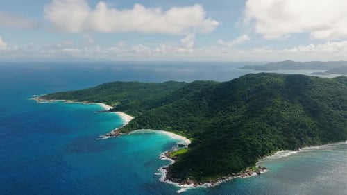 Uninhabited Tropical Island Surrounded By Bright Blue Waters La Digue Seychelles