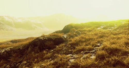 Golden Light Over Rugged Terrain in a Remote Mountainous Area