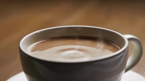 Close Up of Steaming Cup of Coffee