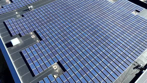 Solar panel units on rooftop of industrial building. Sunny day in ...