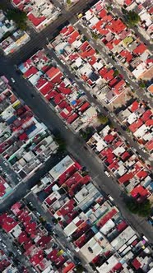 Aerial view of houses with red roofs in Ecatepec, Mexico
