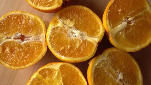 Fresh sliced orange fruit texture on rotating background