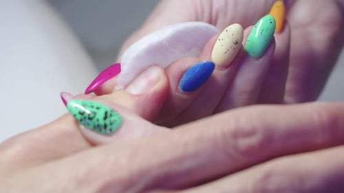 Woman Having Nail Polish Cleaned Off Close Up