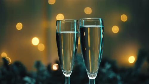 Champagne Glasses on Festive Holiday Background