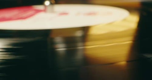 Record Player Needle on Spinning Vinyl Record