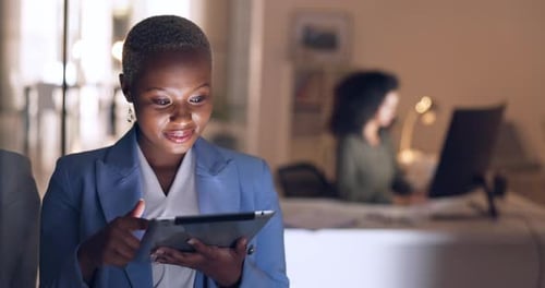 Business, night and black woman working on tablet in corporate office