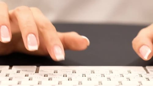 Girl Hands Enter Info Into Computer Over Keyboard Closeup