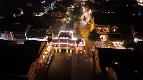 Aerial view of Chua Cau or Japanese Covered ancient Bridge in night