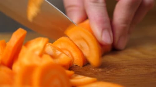 Carrot Sliced Thinly on Cutting Board, Close Up