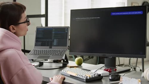 Female Web Developer Watching Vibe Coding Assistant Writing Script