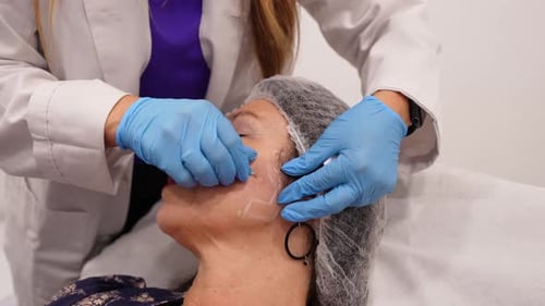 Woman Receives Cosmetic Treatment at a Medical Clinic