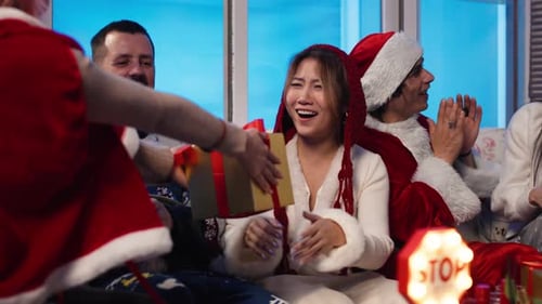 Friends Celebrate Christmas and Exchange Gifts