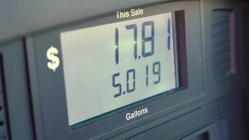 Fuel Pump Screen Showing Rising Price of Gasoline at Gas Station