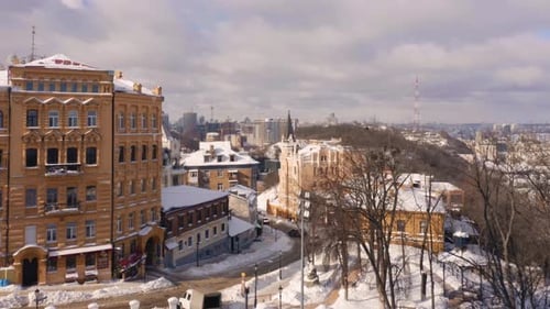 Drone View of the Winter City Covered with Snow