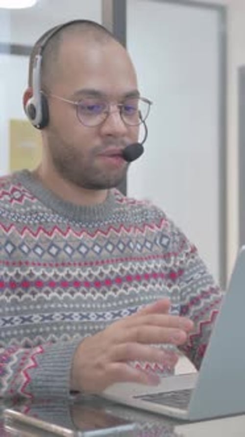 Call Center Employee with Headset Talking with customer Online, vertical video