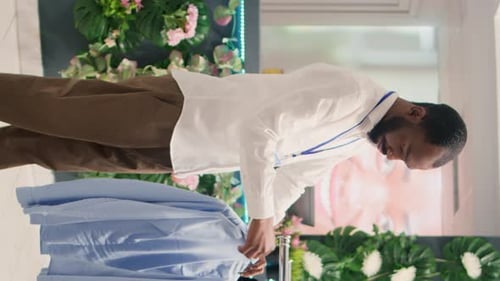 Vertical Video Smiling Employee in Mall Clothing Store