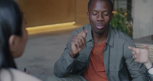 Business Colleagues Discussing Project in Modern Office