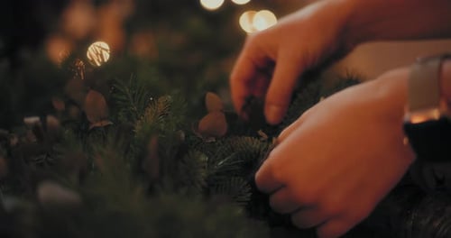 Woman Making Green Fresh Christmas Wreath For Christmas Holidays Florist DIY