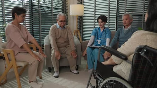 Senior, nurse sit in circle raise to meditate in nursing home